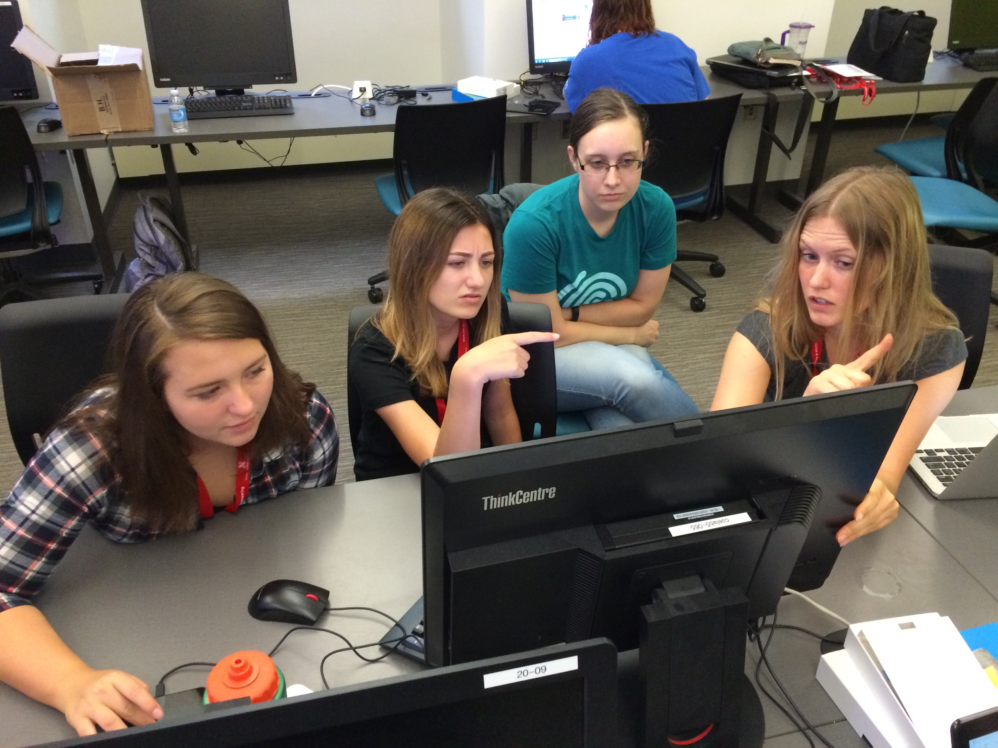 Girl Scouts build an app together at the CSE computer camp.