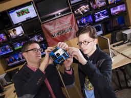 Professor Matt Waite and student Tony Papousek work on 360-degree video project