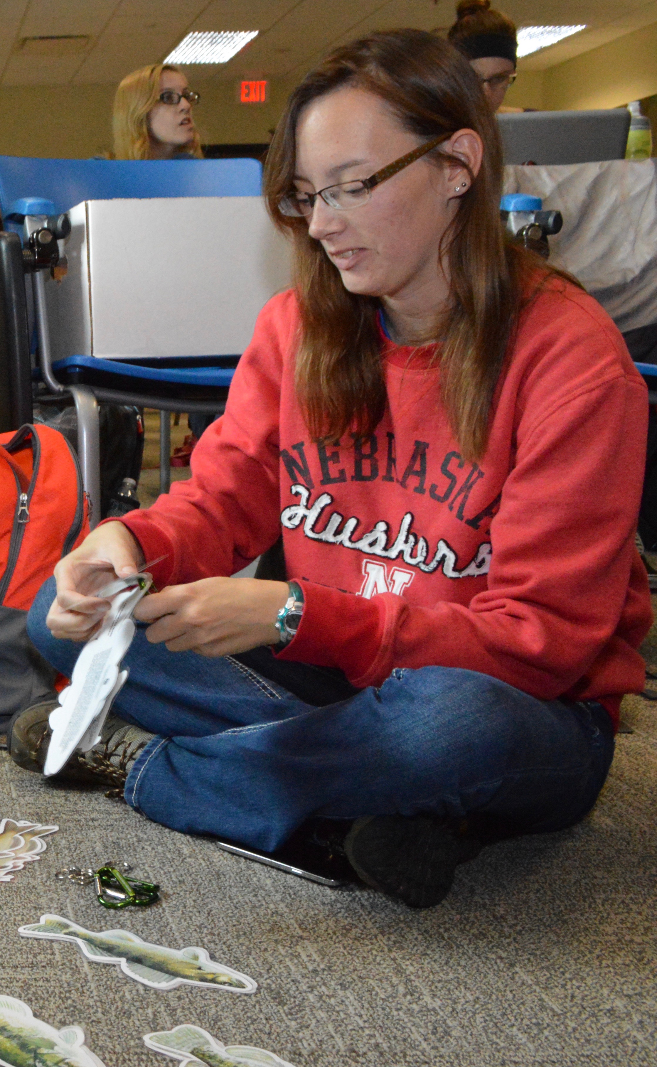 Delanie Bruce, senior fisheries and wildlife major, prepares fish flash cards for the Backpacks for Adventure program. | Shawna Richter-Ryerson, Natural Resources