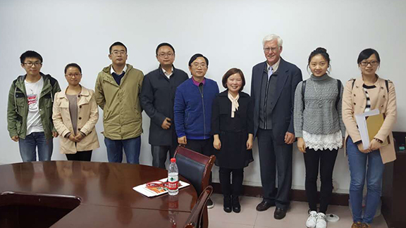 Ian Newman (third from right) and Chongqing Medical University graduate students taking a break from a session of working on their research projects.