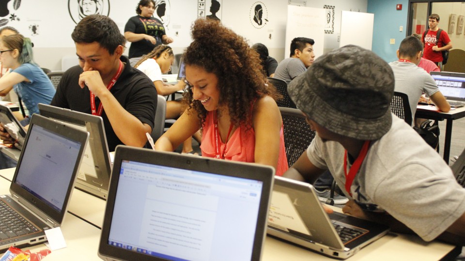 Nebraska College Preparatory Academy students (from left) Edgar Ruiz-Guaderrama, Jissell Cruz and George Siliman, all 12th graders from Grand Island, work on their senior capstone research projects during a recent research bootcamp at UNL.