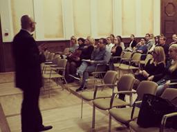 Dipra Jha presenting at Corvinus Business School in Budapest, Hungary.