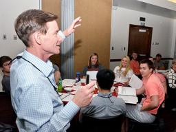Pogue prepares strengths coaches to assist student peers.