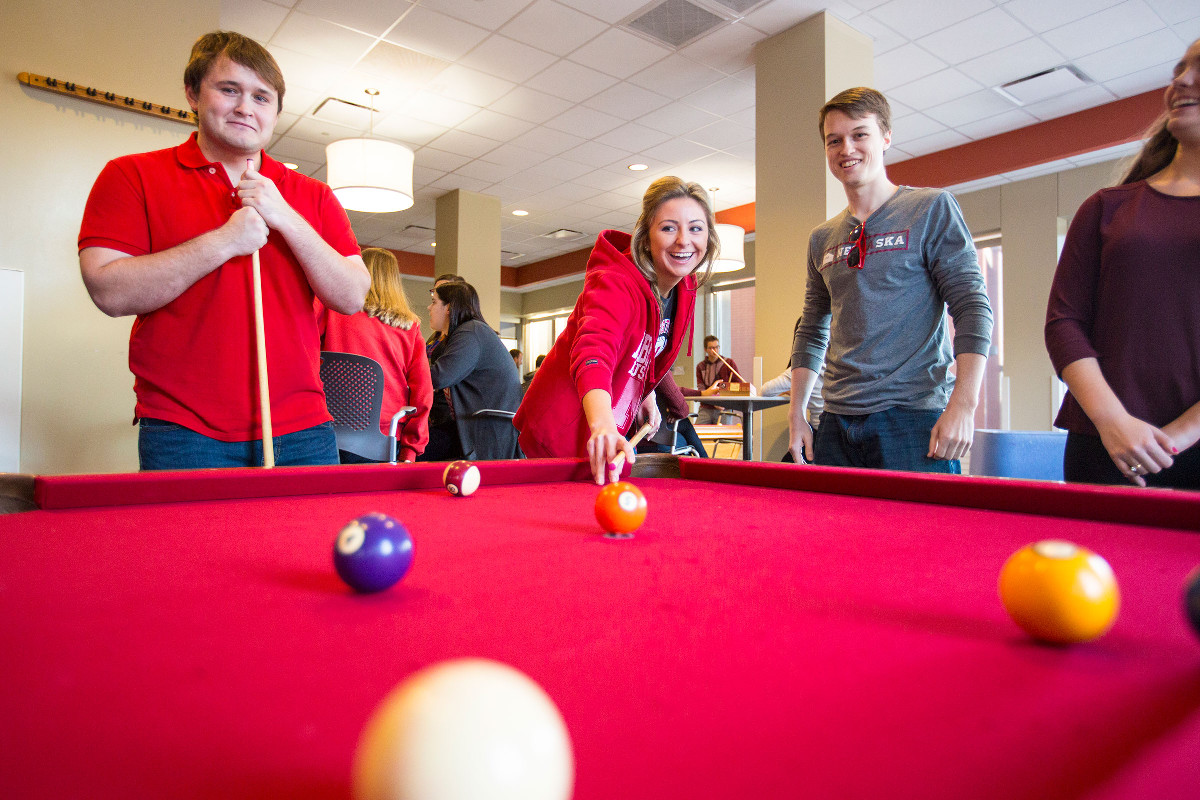 Students play games in the common rooms in University Housing.
