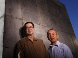 Nebraska engineers Christopher Tuan (left) and Lim Nguyen have developed a cost-effective concrete that shields against damaging electromagnetic energy. Electronics inside structures built or coated with this concrete are protected from electromagnetic in