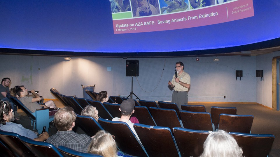John Chapo, president and CEO of the Lincoln Children's Zoo, speaks during a Science Cafe program at Morrill Hall in June 2016. The series allows adults 21 and older to explore science and natural history topics in a casual environment.  Greg Nathan | Uni