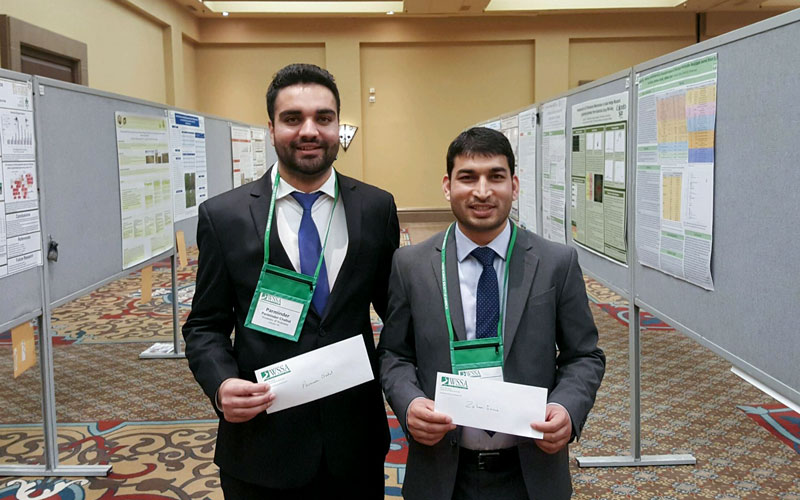 University of Nebraska–Lincoln agronomy doctoral students Parminder Chahal (left) and Zahoor Ganie and postdoc Debalin Sarangi (not pictured) took top honors at the 57th Annual Meeting of the Weed Science Society of America held Feb. 6-9 in Tucson, Arizon