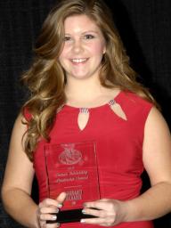 Margaret Silhasek accepts the Outstanding Leadership Award from the National Collegiate Water Ski Association.