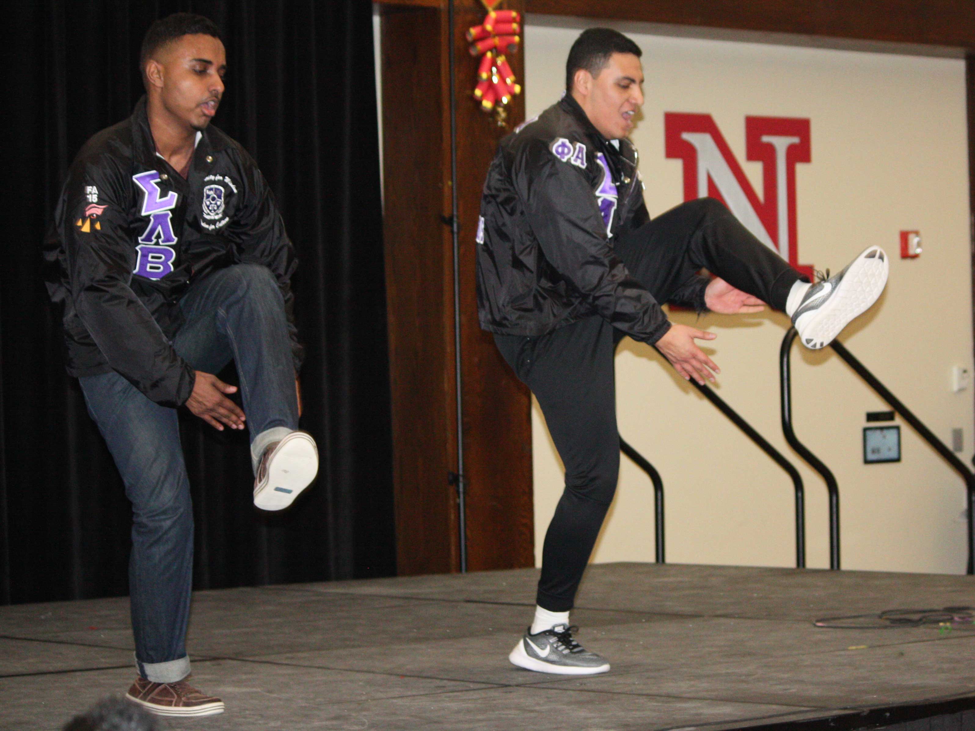 Members of Sigma Lambda Beta perform a stroll at an event earlier in the year.