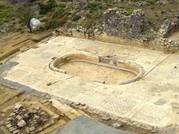 An aerial photograph of the archaeological excavation of Antiochia ad Cragum in Turkey that shows one of the mosaics uncovered at the site.