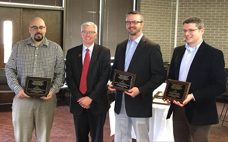 James Schnable (left), ARD Dean and Director Archie Clutter, Dirac Twidwell and Oleh Khalimonchuk at the Junior Faculty for Excellence in Research awards reception on March 22.