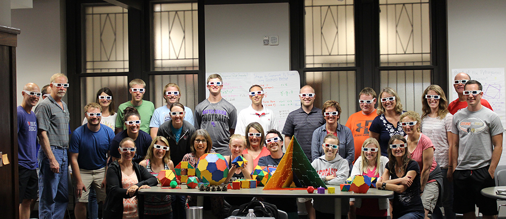 Math 804T teachers show off their polydrons in June 2017.