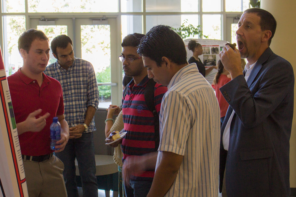 REU participant Vince Morello presents his poster