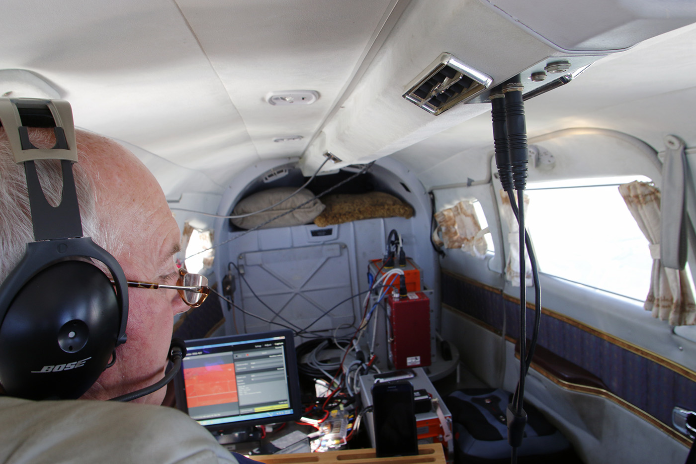 Geoscientist Rick Perk collects airborne remotely sensed data during a flight run over Mead Research Farm this summer. | Shawna Richter-Ryerson, Natural Resources 