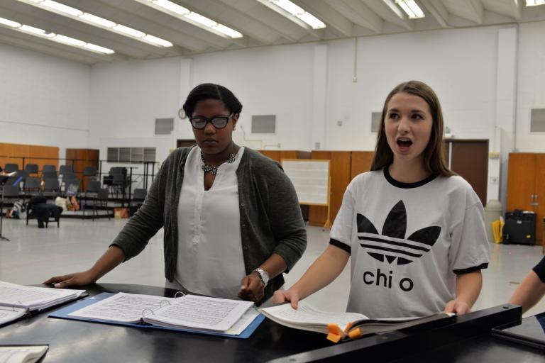 Crystal Dunning (left) and Krista Benesch rehearse the music for "The Ballad of Baby Doe," which travels to North Platte, thanks to the generosity of the James C. and Rhonda Seacrest Tour Nebraska Opera Fund. Photo by Michael Reinmiller.
