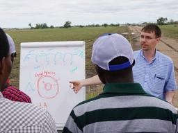 Derek Heeren instructs students on the use of variable rate irrigation.