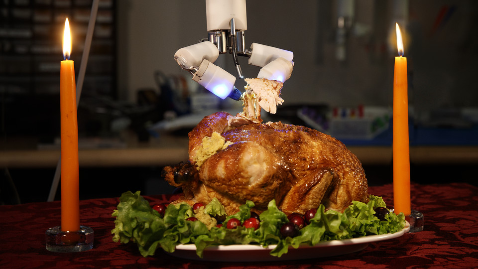 The Virtual Incision mini-robot carves up a rotisserie chicken.