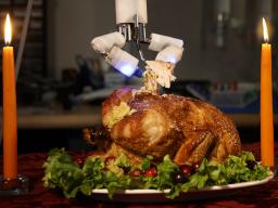 The Virtual Incision mini-robot carves up a rotisserie chicken.