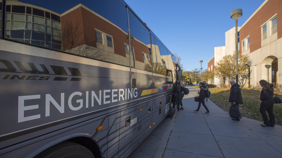 Riders get on the N-E Ride shuttle outside Othmer Hall on the morning of Nov. 16. The weekday shuttle, which started in 2014, is primarily used to connect Nebraska Engineering campuses in Lincoln and Omaha. | Troy Fedderson, University Communication