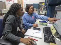 Nebraska's Terri Norton (right) works on a project with Lucy Ampaw Asiedu, a graduate student in architectural engineering. Troy Fedderson | University Communication 