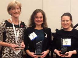 From left, co-authors Susan Sheridan, CYFS director; Amanda Witte, project manager; and Shannon Holmes, postdoctoral fellow at the University of Missouri, accept the award for the 2017 Article of the Year.