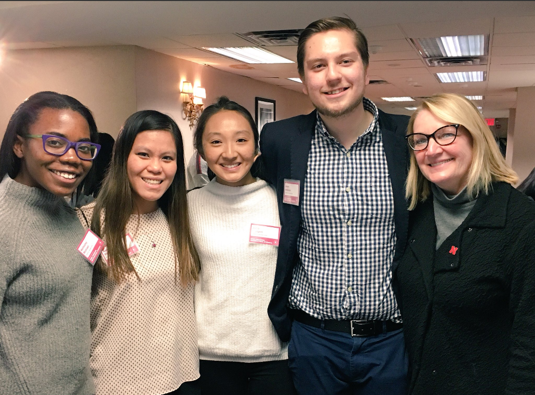 Wellesley Michael, Anna Fobair, Julia Nguyen and Carlos Velasco with CoJMC Interim Dean Amy Sturthers during the MPMS conference. 