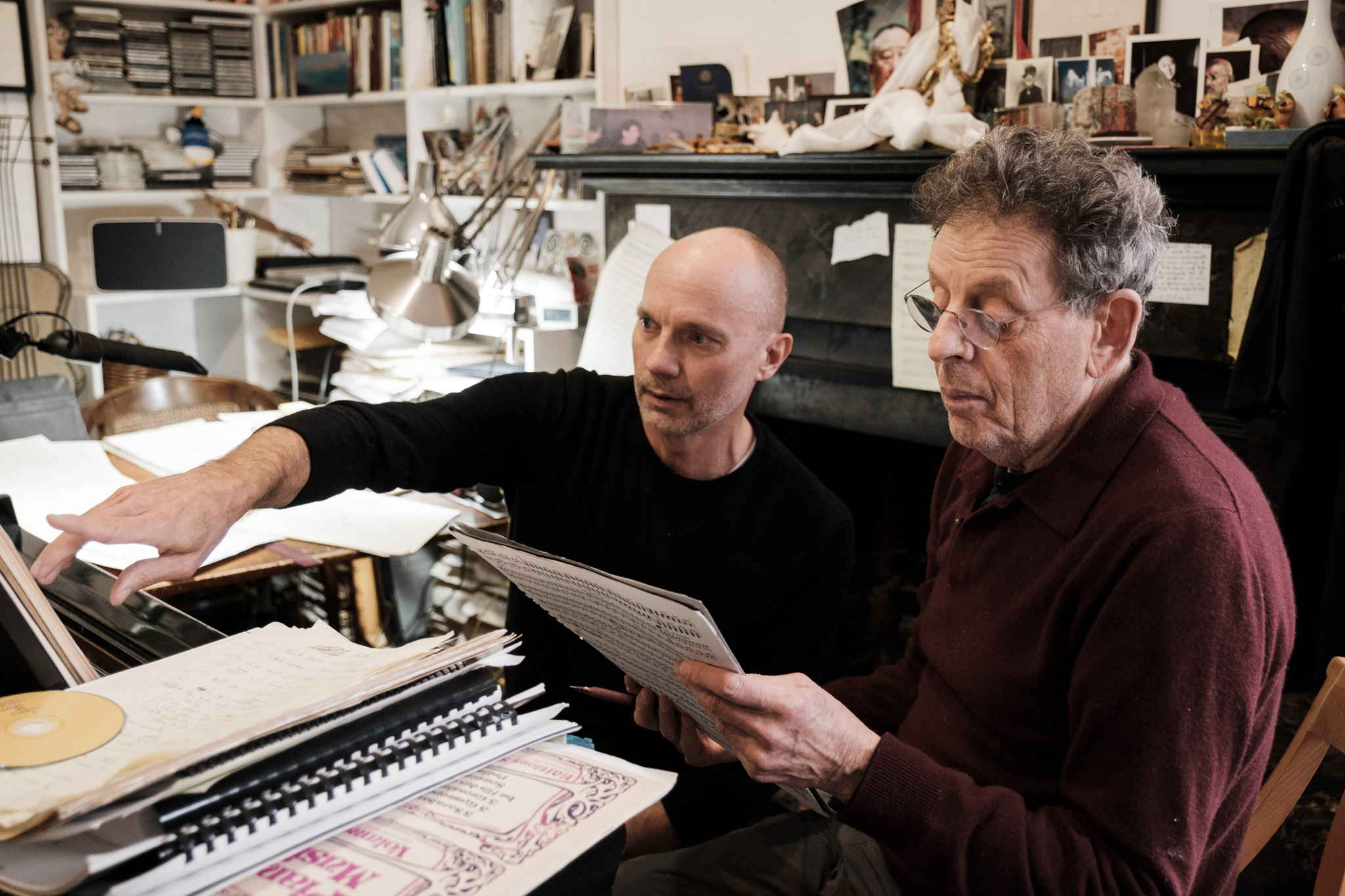 Paul Barnes (left) and Philip Glass review the score for "Annunciation." Photo by Peter Barnes.