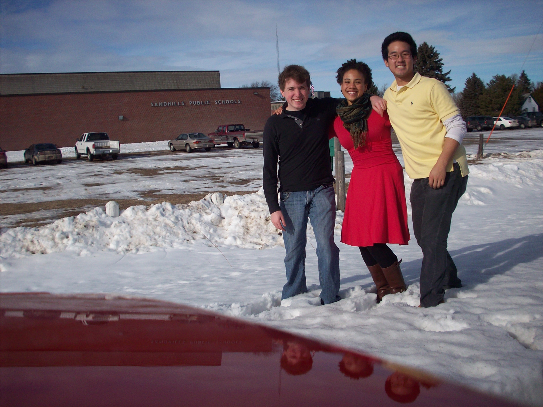 The Ezinma Trio outside Sandhills Public Schools in January. Pictured (from left) is Michael Glur-Zoucha, Meredith Ramsay and Timothy Paek.