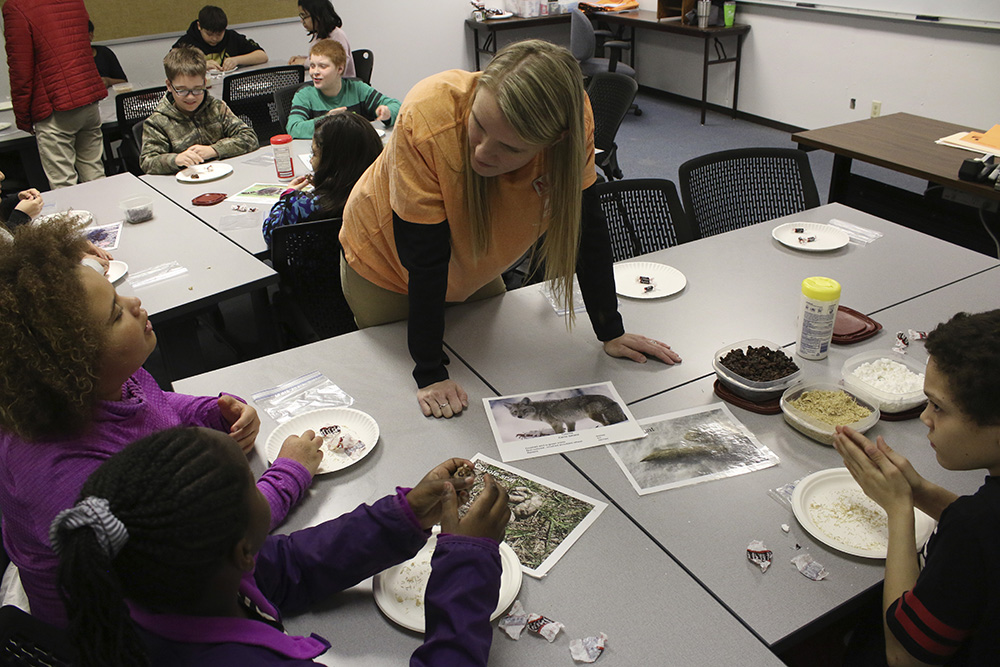 Extension Associate Kate Pulec presented a session about “Scat” in which 5th graders learned what wildlife eat and how this affects their scat (feces). Students also recreated animal scat using  edible foods.