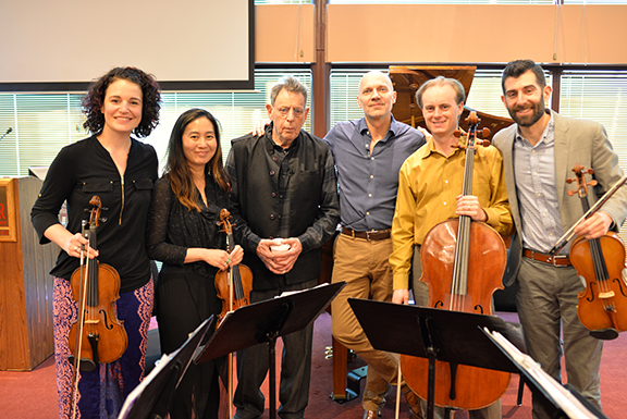 Philip Glass (third from left) with the Chiara String Quartet and Paul Barnes at a rehearsal for "Annunciation" on April 16. Photo by Michael Reinmiller.