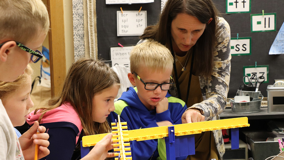 Jennifer Jones, a second-grade teacher at Gretna Elementary School, works with her students on a math lesson. Up to 15 rural Nebraska elementary teachers are being sought to participate in the NebraskaSTEM leadership development program at the University 