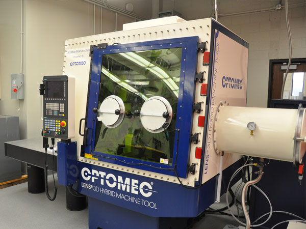 This Optomec Lens 3D Hybrid Machine Tool is one of three state-of-the-art 3-D printers installed in the NEAT Labs.