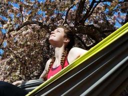 Kelsey Ewert of Ogallala enjoys the sunshine May 4 as she sits in a hammock outside the Nebraska Union. Ewert and more than 4,800 other University of Nebraska–Lincoln students made the spring Deans' List/Explore Center List of Distinguished Students. (Cra