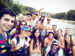 Keeleigh Thayn (second from left in front row) kayaked through the Pont du Gard with a handful of her coworkers at her internship in France.