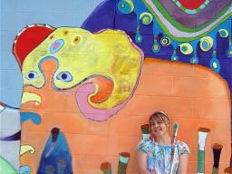 Wendy Bantam poses outside her creation in 2009.