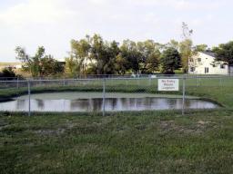 Properly maintained lagoons (pictured on the left) avoid problems such as tall grass and overgrowth of algae.
