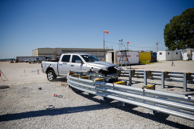 A truck crashes into a bull-nose barrier being tested for use in medians to protect cars from overpass columns. (University Communication photo)