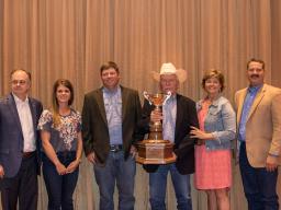 Van Newkirk, Oshkosh, Nebraska, was named the 2018 Beef Improvement Federation Seedstock Producer of the Year during an awards ceremony June 22 in Loveland, Colorado. Pictured are (from left) Steve May, BEEF magazine, award sponsor; Sara, Kolby, Joe and C