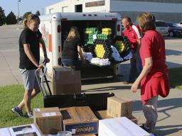 4-H staff transport all Lancaster County 4-H static exhibits for the Nebraska State Fair to Grand Island and back